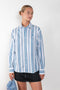 The Striped Shirt 51 by Acne Studios has an all-over stripe pattern and is detailed with a micro face logo embroidery on the chest and a face logo on the back