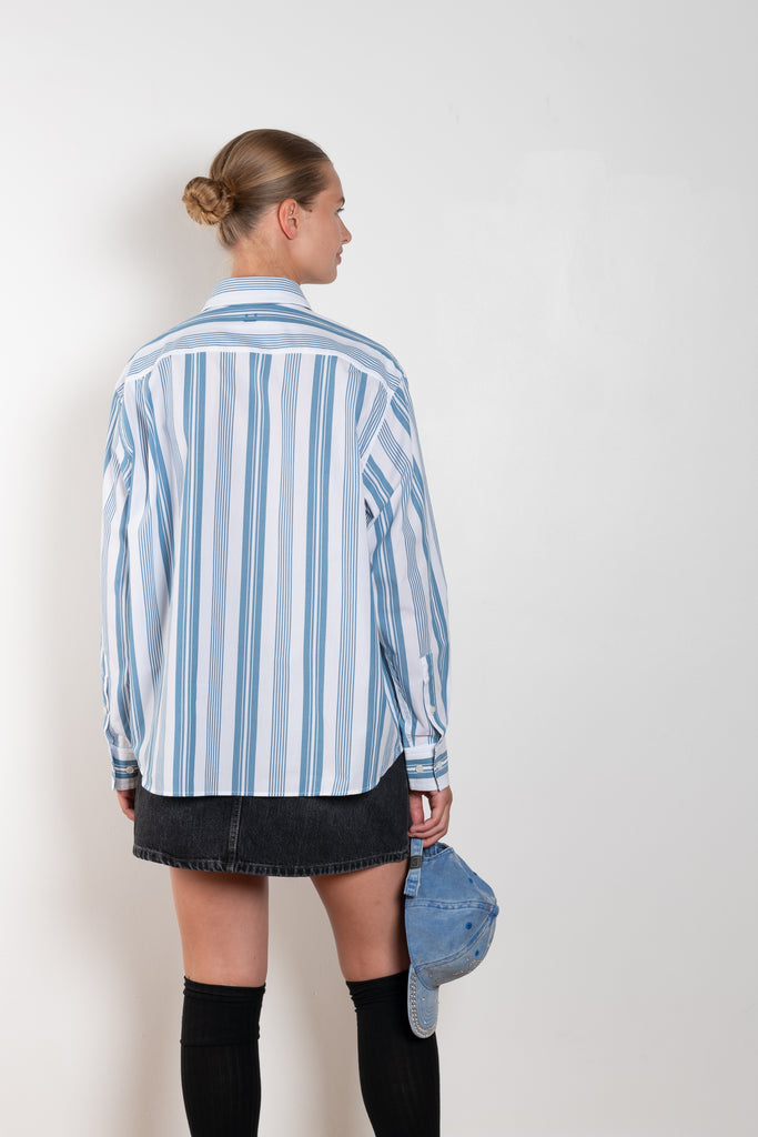 The Striped Shirt 51 by Acne Studios has an all-over stripe pattern and is detailed with a micro face logo embroidery on the chest and a face logo on the back