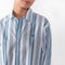The Striped Shirt 51 by Acne Studios has an all-over stripe pattern and is detailed with a micro face logo embroidery on the chest and a face logo on the back