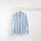 The Striped Shirt 51 by Acne Studios has an all-over stripe pattern and is detailed with a micro face logo embroidery on the chest and a face logo on the back