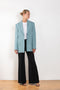 The Flared Trouser 1062 by Acne Studios is a high waisted tailored trouser with flared legs and big cuffs