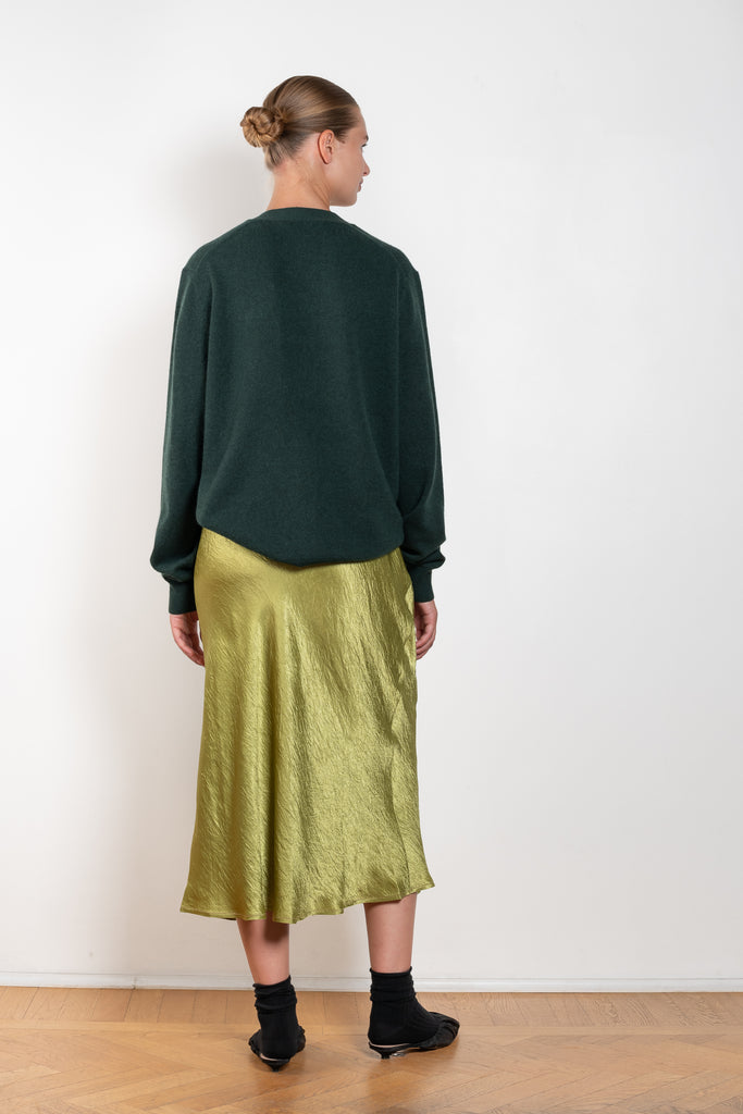 The Satin Wrap Skirt 560 by Acne Studios is made from a satin fabric with a crinkled finish, detailed with a tie-up closure and contrast topstitching