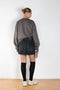 The Denim Mini Skirt 388 by Acne Studios is cut to a relaxed a-line silhouette with a high rise and mid-thigh length