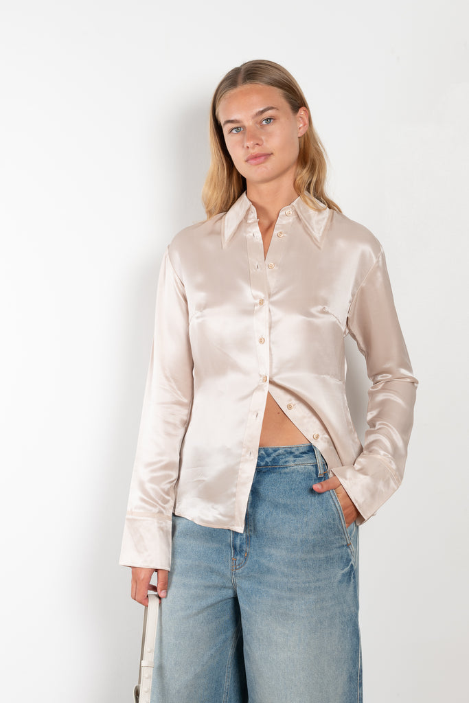 The Silk Shirt 925 by Acne Studios is detailed with contrast fabric raw edges on the collar and cuffs in a fluid silk blend 