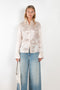 The Silk Shirt 925 by Acne Studios is detailed with contrast fabric raw edges on the collar and cuffs in a fluid silk blend 