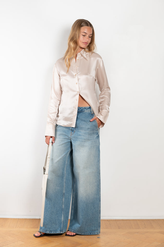 The Silk Shirt 925 by Acne Studios is detailed with contrast fabric raw edges on the collar and cuffs in a fluid silk blend 