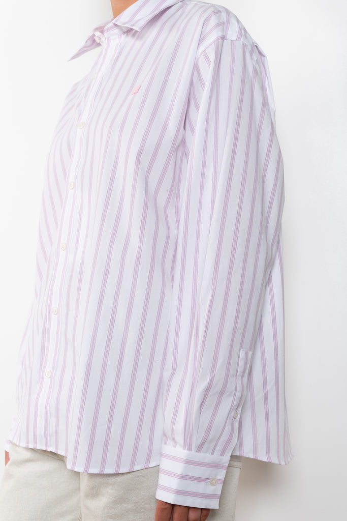 The Striped Shirt 51 by Acne Studios has an all-over stripe pattern and is detailed with a micro face logo embroidery on the chest and a face logo on the back