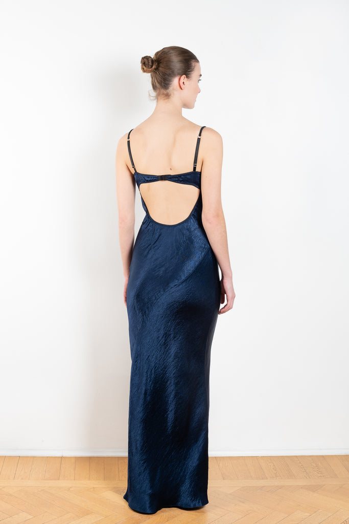 The Bijou Maxi Dress by Anna October is a signature evening maxi dress with an open back and lingerie details
