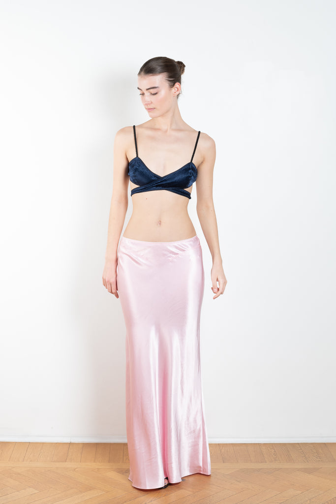 The Janiyah Midi Skirt by Anna October is a signature lightweight summer skirt with a side slit  and lingerie inspired details
