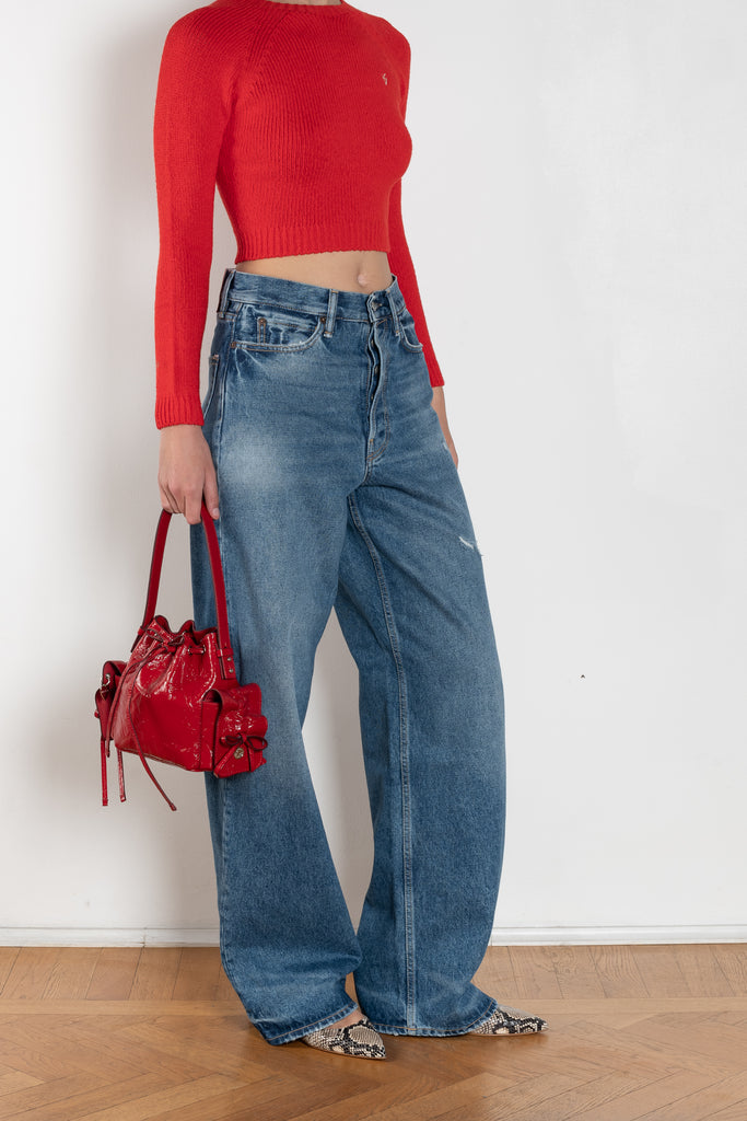 The 1981F Jeans by Acne Studios are cut to a loose fit with a low waist, wide leg and long length