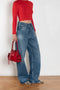 The 1981F Jeans by Acne Studios are cut to a loose fit with a low waist, wide leg and long length
