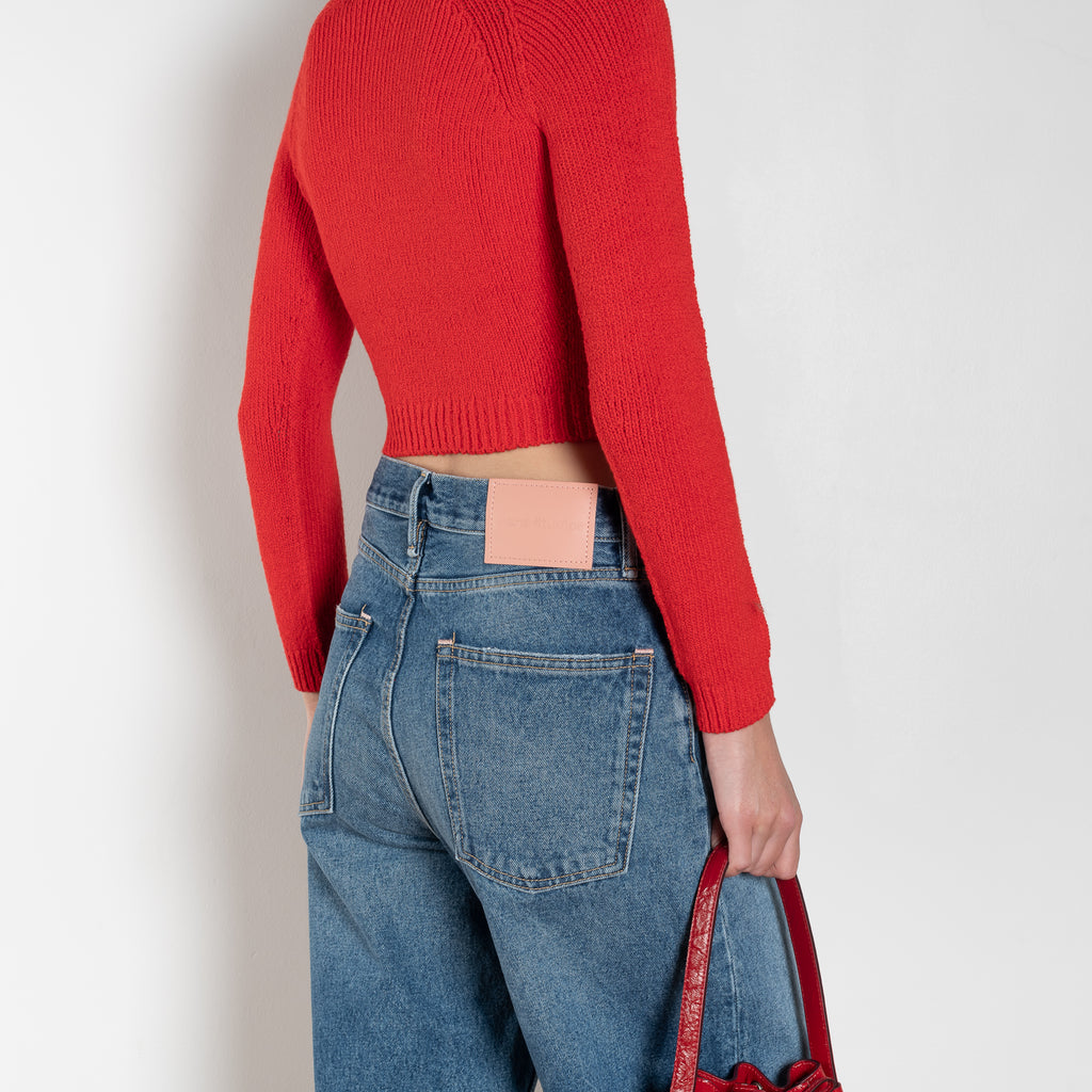 The 1981F Jeans by Acne Studios are cut to a loose fit with a low waist, wide leg and long length