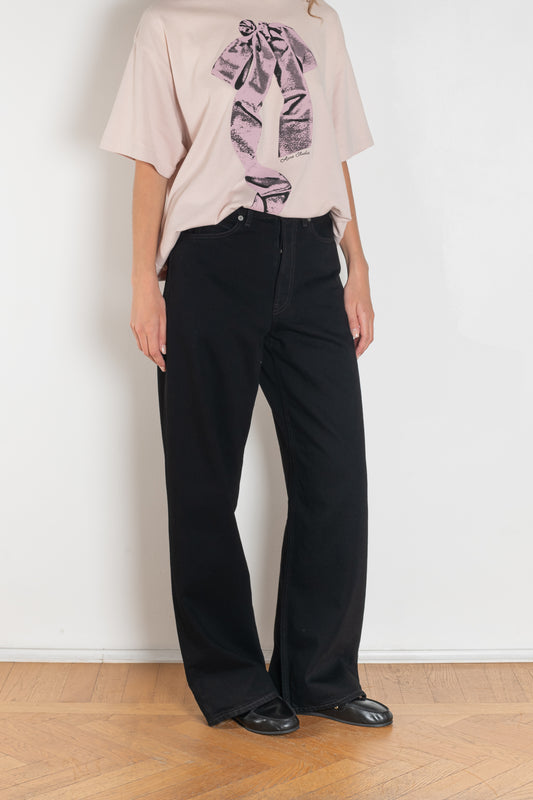 The 1981F Jeans by Acne Studios are cut to a loose fit with a low waist, wide leg and long length. Crafted from non-stretch denim in black