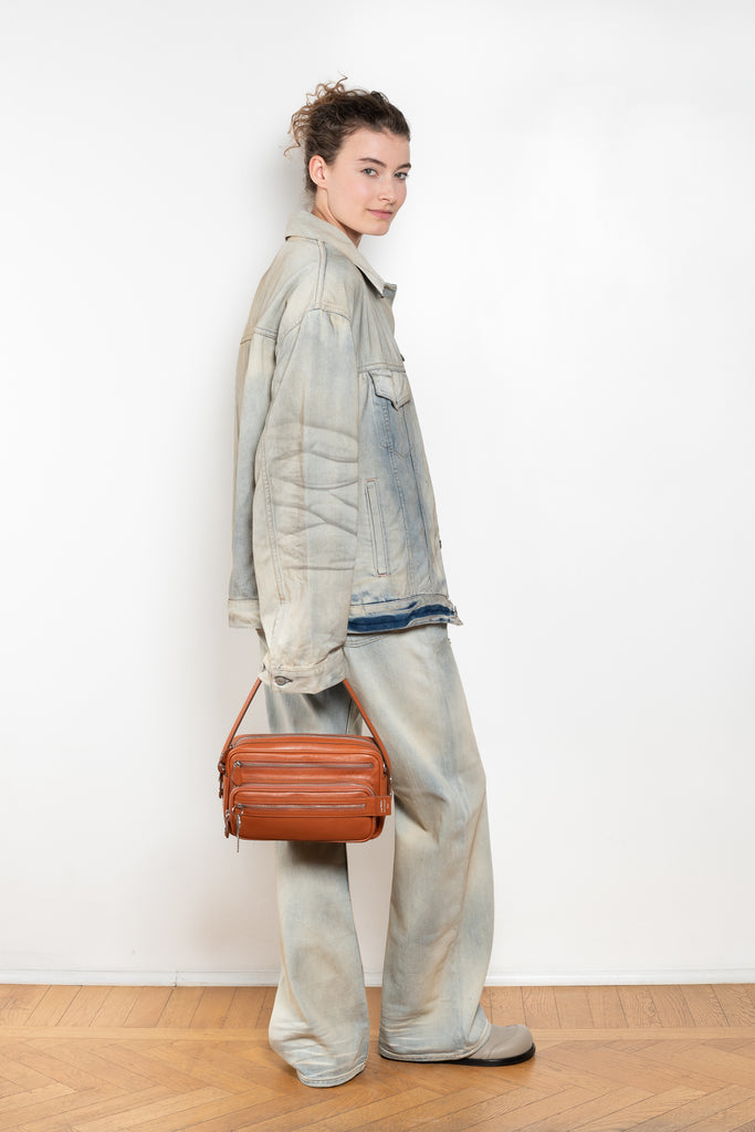 The 2021 Loose Fit Jeans by Acne Studios are cut to a loose fit with mid-waist, wide leg and long length