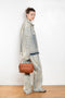 The 2021 Loose Fit Jeans by Acne Studios are cut to a loose fit with mid-waist, wide leg and long length