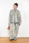 The 2021 Loose Fit Jeans by Acne Studios are cut to a loose fit with mid-waist, wide leg and long length