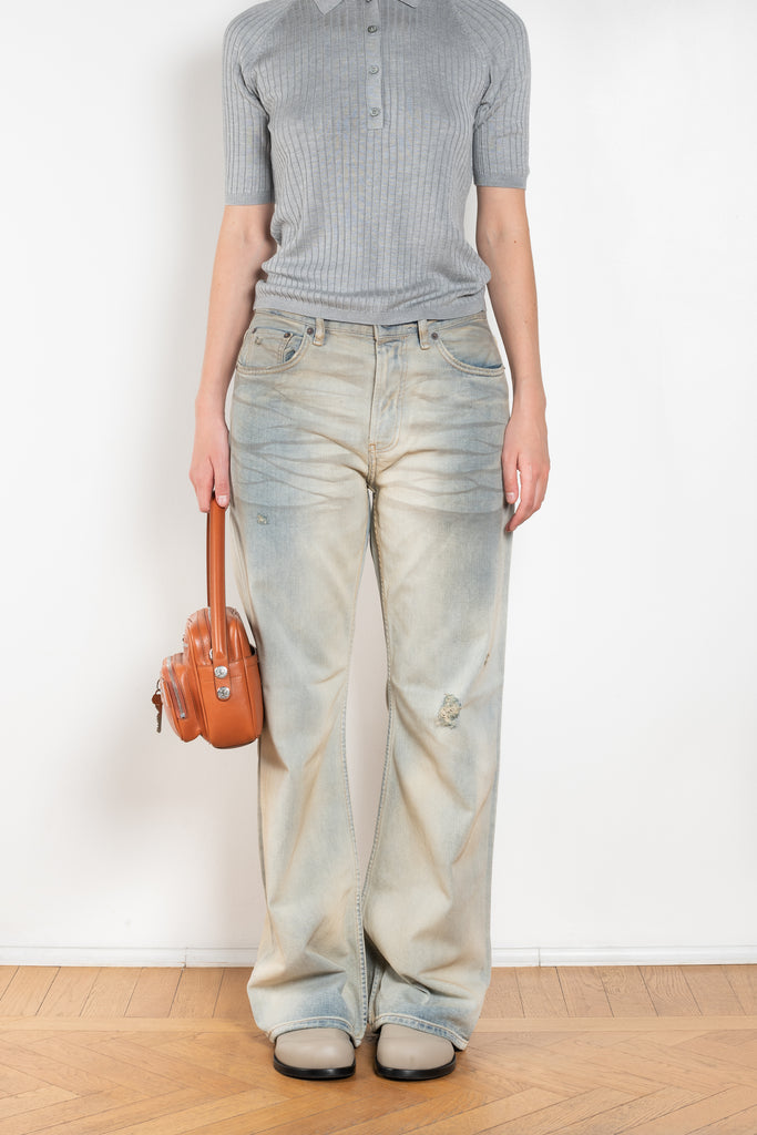 The 2021 Loose Fit Jeans by Acne Studios are cut to a loose fit with mid-waist, wide leg and long length