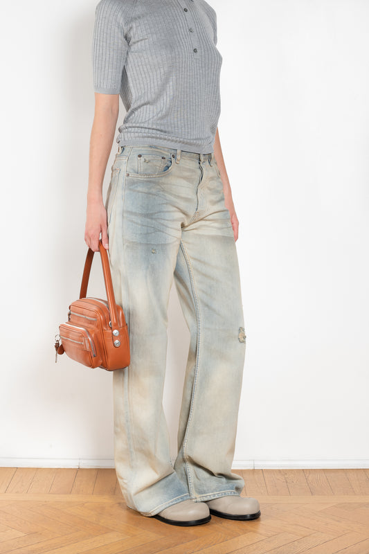 The 2021 Loose Fit Jeans by Acne Studios are cut to a loose fit with mid-waist, wide leg and long length