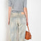 The 2021 Loose Fit Jeans by Acne Studios are cut to a loose fit with mid-waist, wide leg and long length