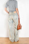 The 2021 Loose Fit Jeans by Acne Studios are cut to a loose fit with mid-waist, wide leg and long length
