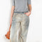 The 2021 Loose Fit Jeans by Acne Studios are cut to a loose fit with mid-waist, wide leg and long length