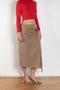 The Belted Twill Skirt by Acne Studios is crafted from classic cotton twill, featuring a trench-style belt at the hip with a leather buckle and embroidered eyelets