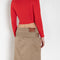 The Belted Twill Skirt by Acne Studios is crafted from classic cotton twill, featuring a trench-style belt at the hip with a leather buckle and embroidered eyelets