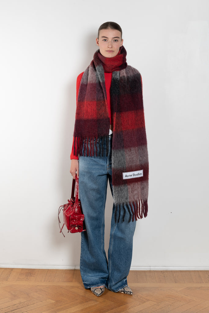 The Mohair Checked Scarf by Acne Studios is crafted from a wool mohair blend detailed with an embroidered logo label.