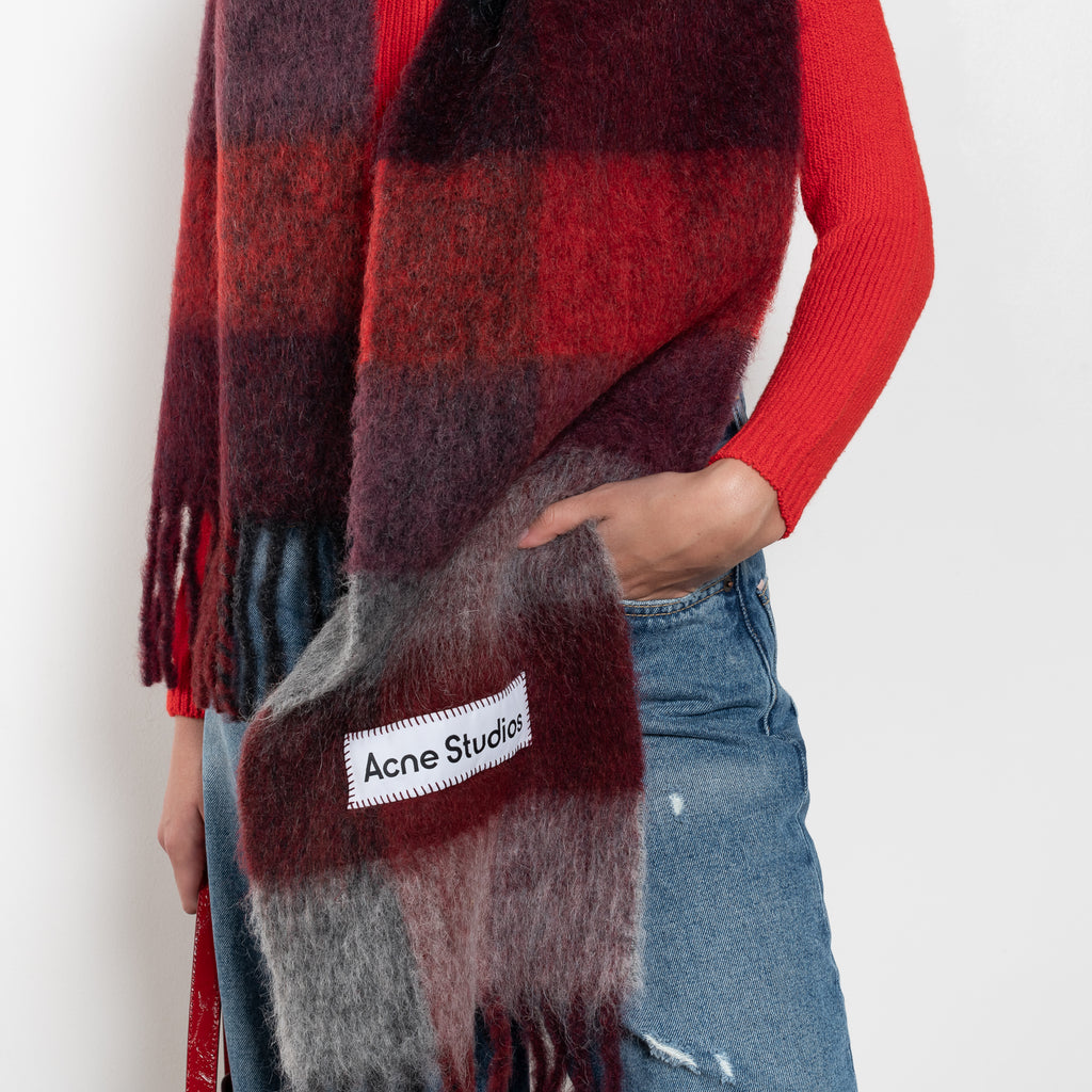The Mohair Checked Scarf by Acne Studios is crafted from a wool mohair blend detailed with an embroidered logo label.