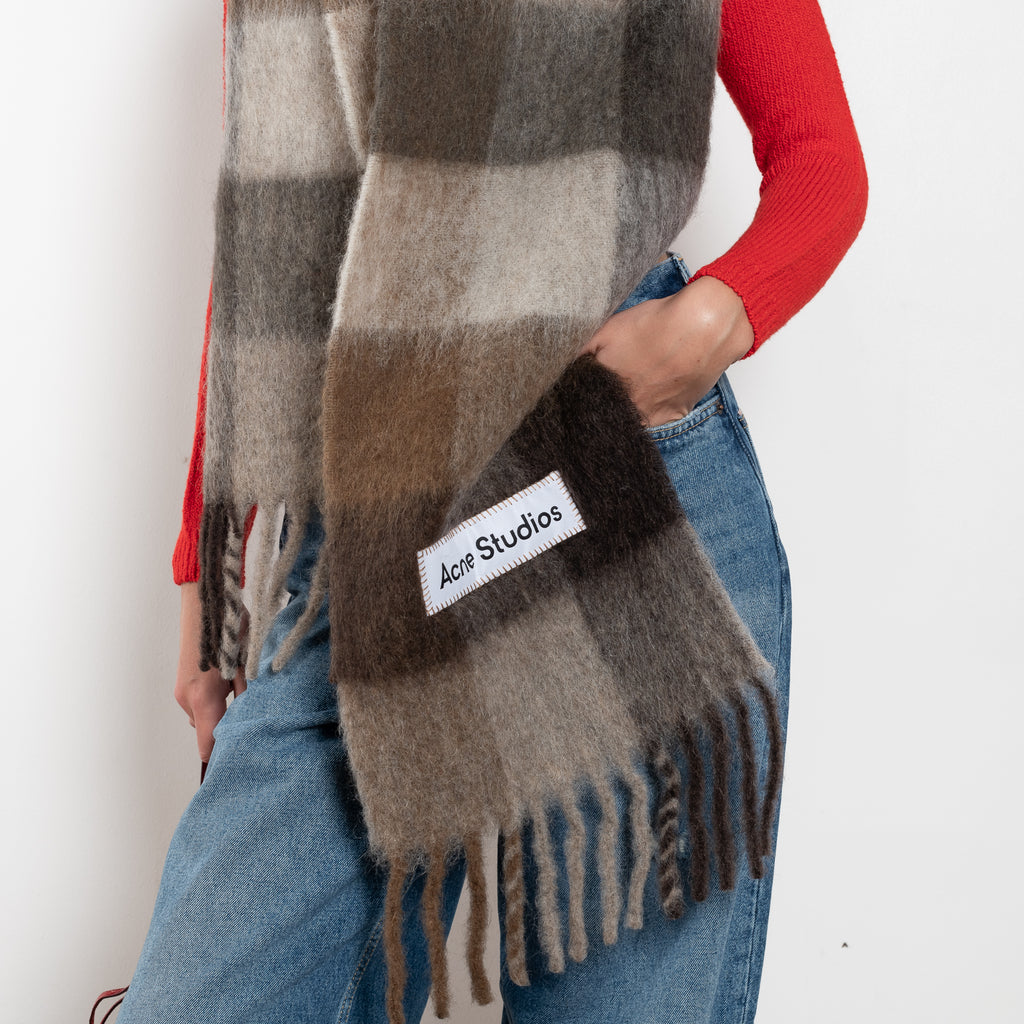 The Mohair Checked Scarf by Acne Studios is crafted from a wool mohair blend detailed with an embroidered logo label.