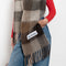 The Mohair Checked Scarf by Acne Studios is crafted from a wool mohair blend detailed with an embroidered logo label.