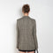 The Check Suit Jacketby Acne Studios is a single-breasted suit jacket with a check bicolour pattern