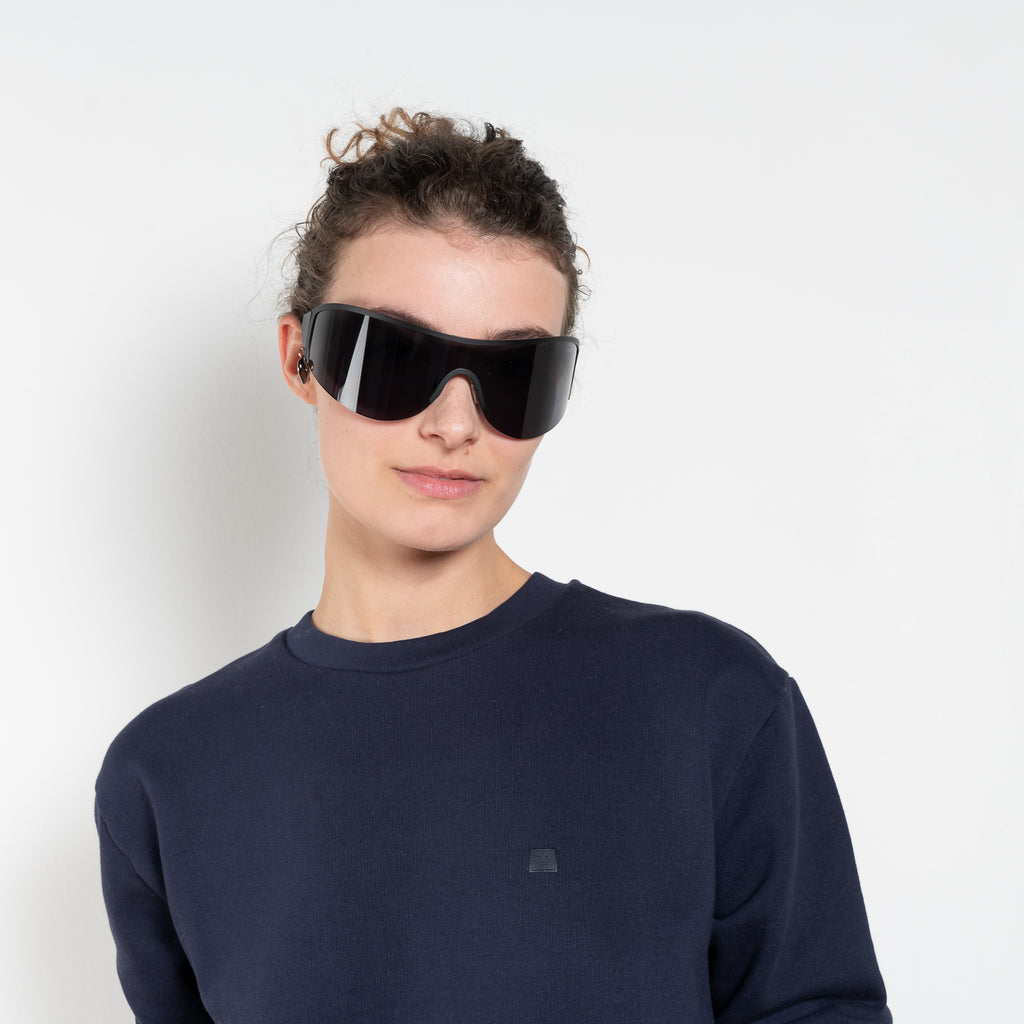 The Crew Neck Fleece Sweater by Acne Studios is made from a fleece cotton with a soft brushed finish, adorned with a seasonal Face logo embroidery and branding at the back