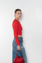 The Cropped Crewneck Sweater by Acne Studios has a fitted silhouette, featuring 3/4-length sleeves and a cropped length