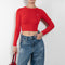 The Cropped Crewneck Sweater by Acne Studios has a fitted silhouette, featuring 3/4-length sleeves and a cropped length