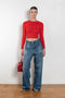 The Cropped Crewneck Sweater by Acne Studios has a fitted silhouette, featuring 3/4-length sleeves and a cropped length