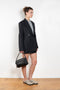 The Pinstripe Jacket by Acne Studios is a double-breasted suit jacket in a wool blend yarn pinstripe woven in a fine herringbone structure and drape finish