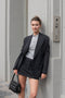 The Pinstripe Jacket by Acne Studios is a double-breasted suit jacket in a wool blend yarn pinstripe woven in a fine herringbone structure and drape finish