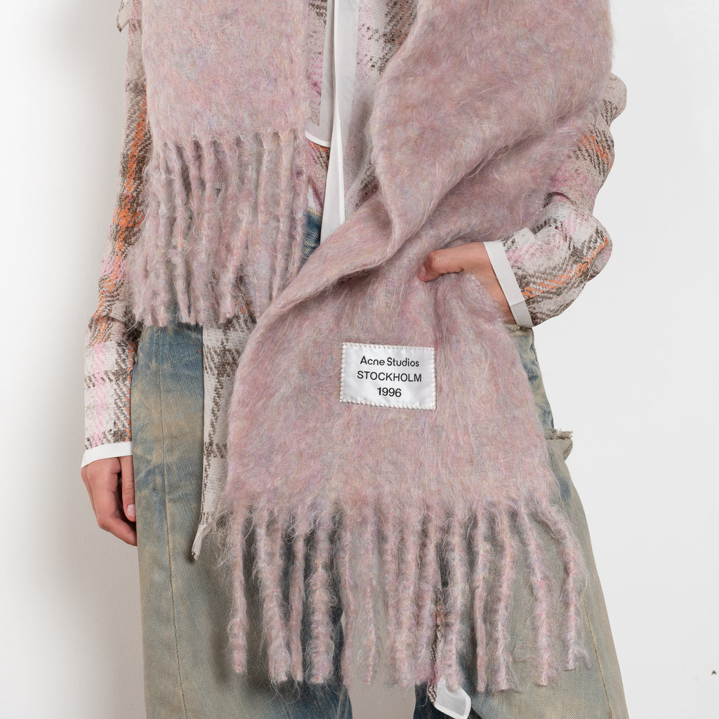 The Fringed Scarf Logo Label by Acne Studios is crafted from a wool alpaca blend detailed with an embroidered logo label.