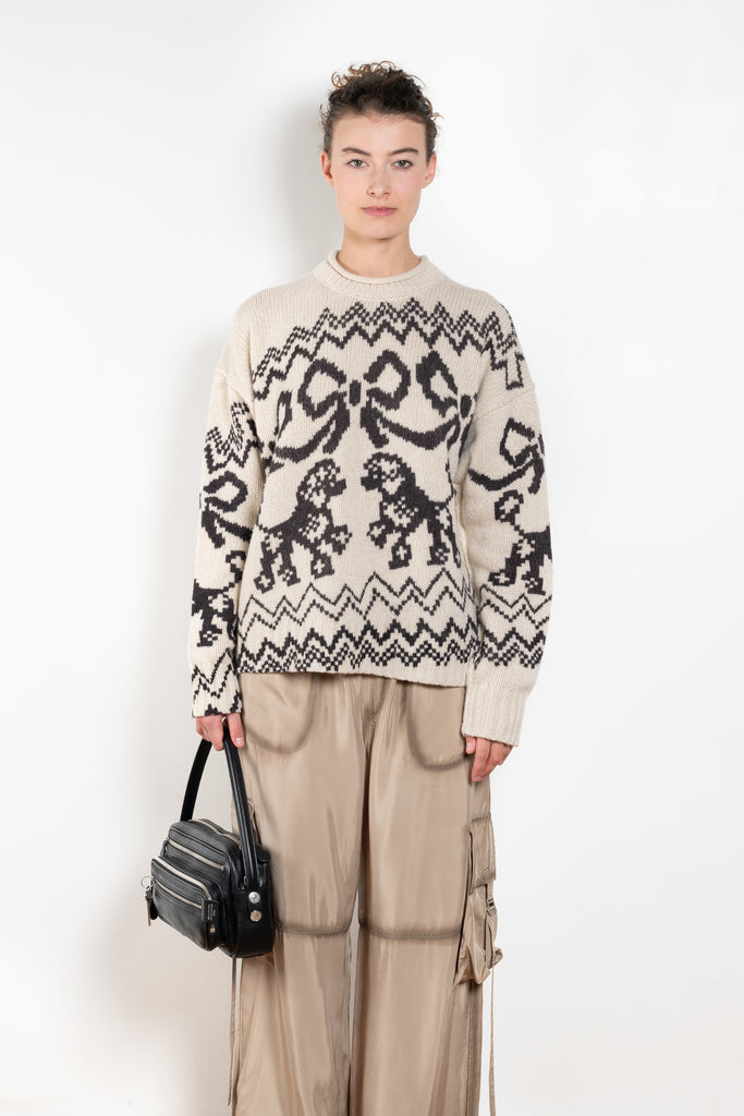 The Jacquard Sweater 818 by Acne Studios is a crew neck sweater with a relaxed fit and below hip length. Detailed with an all-over jacquard seasonal animation.