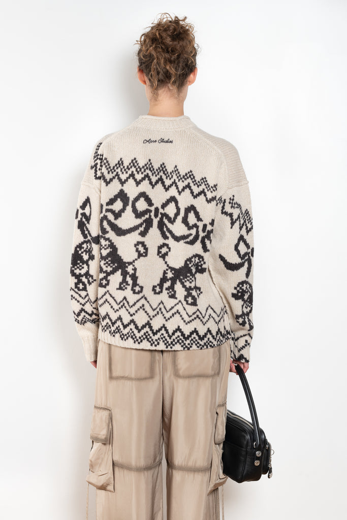 The Jacquard Sweater 818 by Acne Studios is a crew neck sweater with a relaxed fit and below hip length. Detailed with an all-over jacquard seasonal animation.