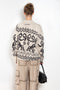 The Jacquard Sweater 818 by Acne Studios is a crew neck sweater with a relaxed fit and below hip length. Detailed with an all-over jacquard seasonal animation.