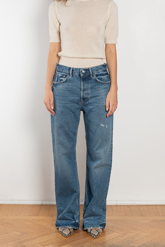 The 2021 Loose Fit Jeans by Acne Studios are cut to a loose fit with mid-waist, wide leg and long length. Made from rigid denim in a medium blue wash.