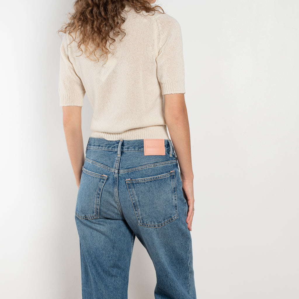 The 2021 Loose Fit Jeans by Acne Studios are cut to a loose fit with mid-waist, wide leg and long length. Made from rigid denim in a medium blue wash.