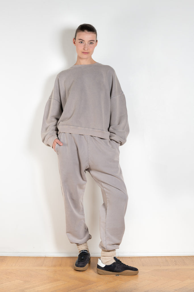 The Jogging 0015 by Acne Studios are mid waist joggers with an elastic waistband and a small rubber logo patch on the back center