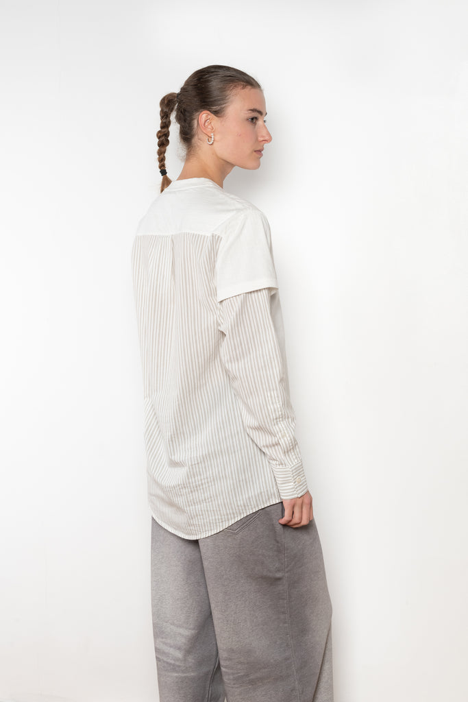 The Layered Shirt by Acne Studios is a layered t-shirt with a relaxed fit and integrated long sleeve shirt with base-ball inspirations