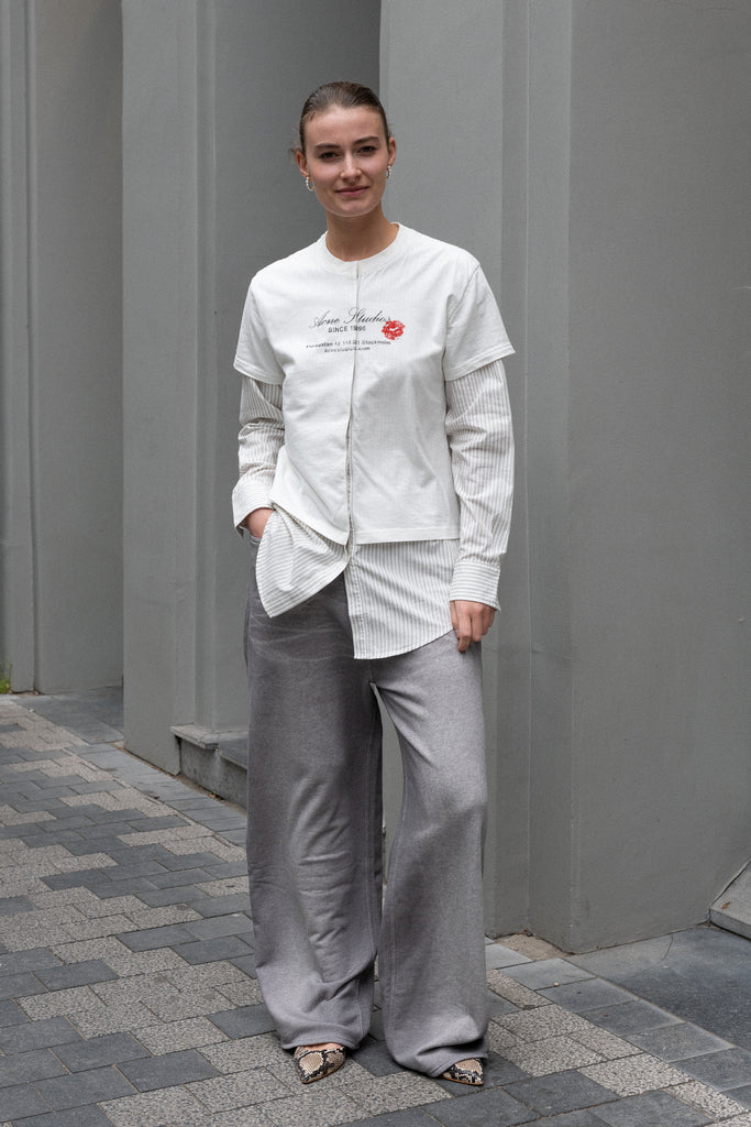 The Layered Shirt by Acne Studios is a layered t-shirt with a relaxed fit and integrated long sleeve shirt with base-ball inspirations