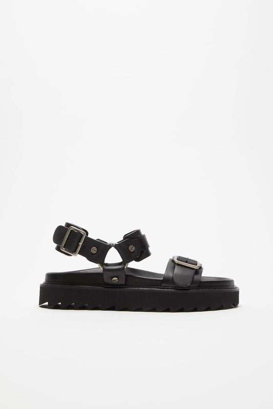 The Leather Buckle Sandal by Acne Studios is a strap sandals feature biker-inspired silver-tone metal buckles