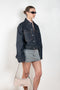 The Monogram Mini Skirt 643 by Acne Studios is cut to a regular fit with a straight shape, low waist and mini length