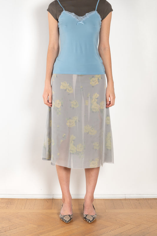 The Mesh Layered Skirt by Acne Studios features seasonal floral artwork, adorned with shredded cuts and double-layered mesh construction